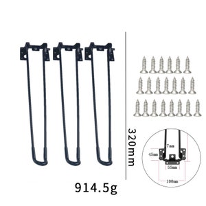 May include: Three black metal table legs with a 320 mm length and a 914.5 g weight. The legs have a bracket with a 7 mm, 45 mm, 55 mm, and 100 mm measurement. The image also shows 24 silver screws.