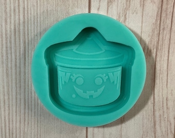 Molde de resina con forma de cubo de bruja