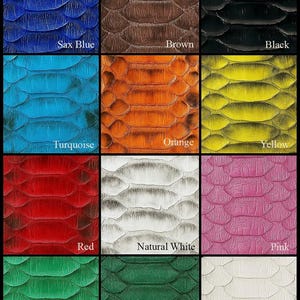 May include: A grid of textured leather swatches in various colors. Colors include Sax Blue, Brown, Black, Turquoise, Orange, Yellow, Red, Natural White, Pink, Light Green, Dark Green, and White. Each swatch has a scale-like pattern.
