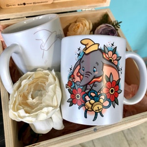 Disney Dumbo mug. Sold individually.