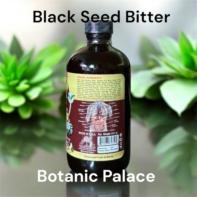 K&ouml;nnte beinhalten: Eine braune Glasflasche mit Black Seed Bitter, auf der die biologischen Inhaltsstoffe aufgelistet sind. Das Etikett enth&auml;lt auch ein Diagramm des menschlichen Verdauungssystems und den Text "Eliminated Toxin & Waste".