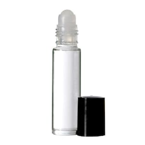 May include: A clear glass roller bottle with a black cap. The bottle is empty and ready to be filled with your favorite essential oil or fragrance.