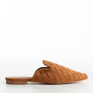 May include: A single brown woven mule shoe with a pointed toe. The shoe has a low heel and a slip-on design. The upper is made of a woven material, and the sole is a solid color.