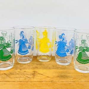 Bustling Betty Swanky Swigs by Kraft, 5 ounce Juice Glasses in Blue, Green, and Yellow