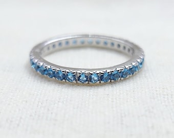 フルエタニティブルートパーズリング、トパーズ結婚指輪、ブルー