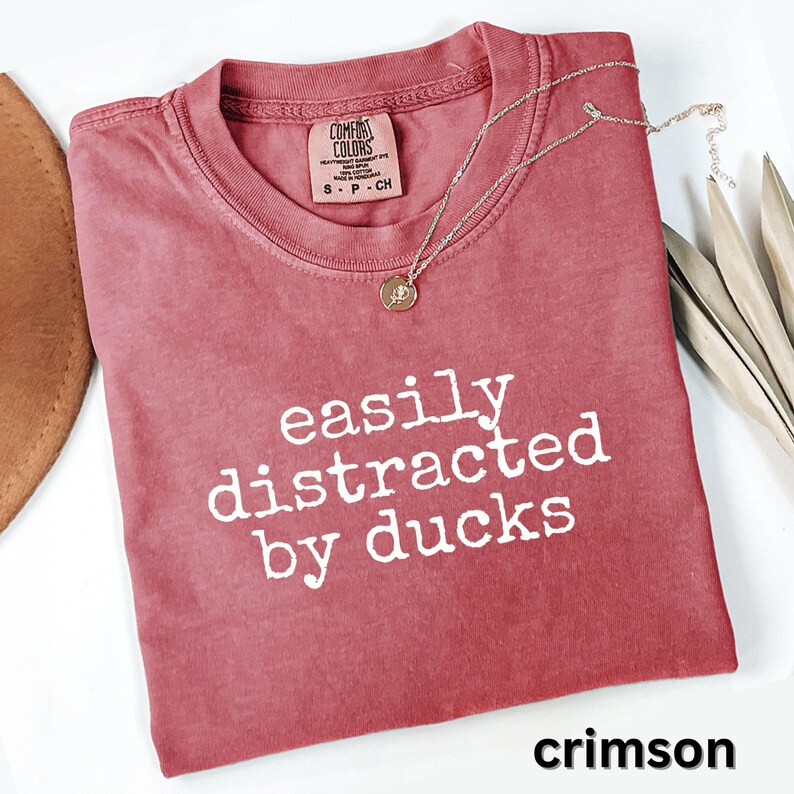 Easily distracted by ducks shirt, funny graphic tee, cute slogan t-shirt, humorous casual wear, gift for duck lovers, crimson shirt