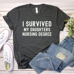 I Survived My Daughter&#39;s Nursing Degree, Funny Nurse Graduation Gift, Mom Shirt for College Graduation