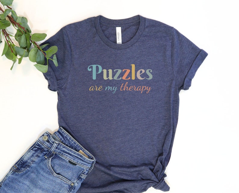 a t - shirt that says puzzles are my therapy