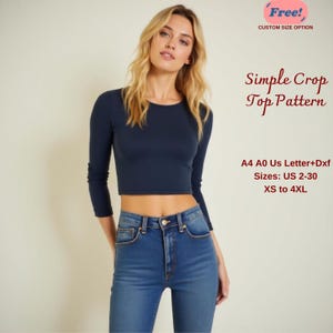 May include: A navy blue long-sleeved crop top pattern with a round neckline. The pattern includes sizes UK 4-34, XS to 4XL. The pattern is available in A4, A0, and UK Letter sizes, as well as in Dxf format.