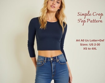 May include: A navy blue long-sleeved crop top pattern with a round neckline. The pattern includes sizes US 2-30, XS to 4XL. The pattern is available in A4, A0, and US Letter sizes, as well as in Dxf format.