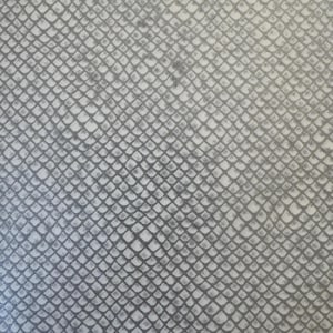 May include: A close-up of a fabric with a repeating pattern resembling snake scales. The scales are a muted gray color, outlined in a darker gray, creating a textured appearance against a light gray background.
