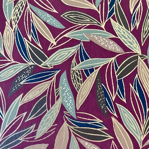 May include: A repeating pattern of stylized leaves in shades of gold, brown, blue, and green on a deep burgundy background.