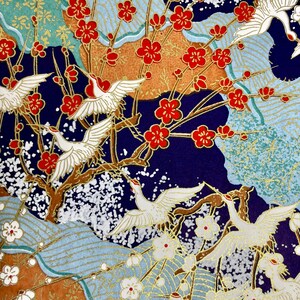 May include: A blue background with white cranes flying among red and white flowers. The background is decorated with gold and silver accents.