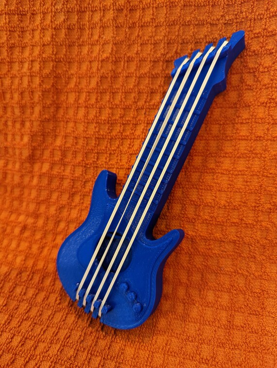 Playable miniature guitar deals