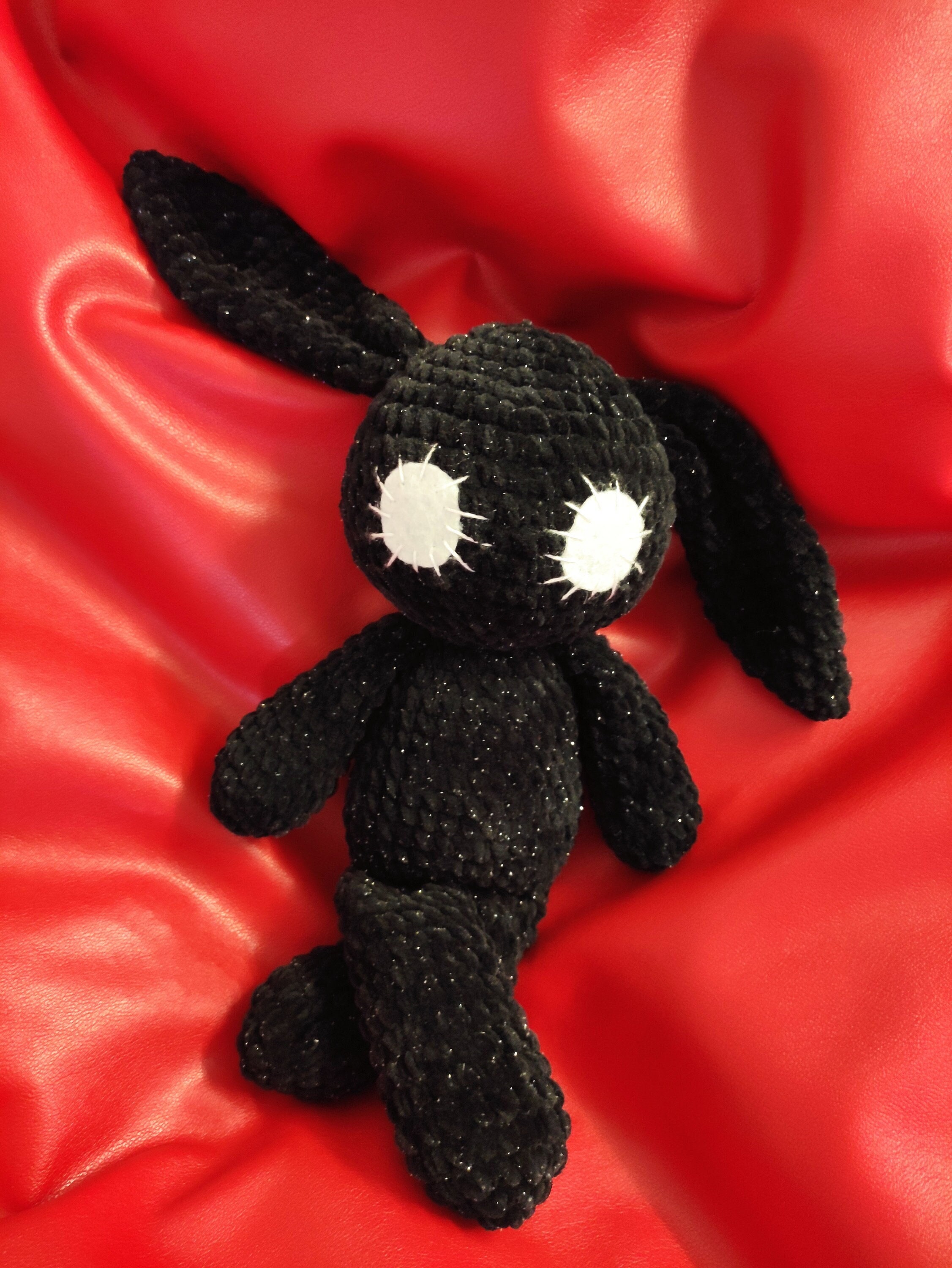 Creepy black bunny plush. Scary stuffed animal. Rabbit toy.