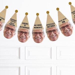 May include: A retirement party banner featuring smiling faces wearing gold glitter party hats. Each hat has a different message, including "Relax Mode On," "Goodbye Tension, Hello Pension!" and "Cheers to Retirement."
