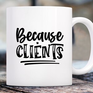 May include: White ceramic mug with a curved handle. The mug features the black text "Because CLIENTS" in a bold, handwritten style. The mug is designed for hot beverages and is suitable for home or office use.