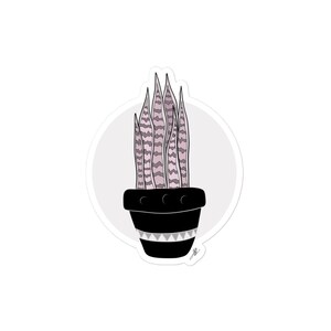 May include: A sticker featuring a potted snake plant illustration. The plant has pink and grey striped leaves and sits in a black pot with a geometric design. The sticker is set against a light grey circle.