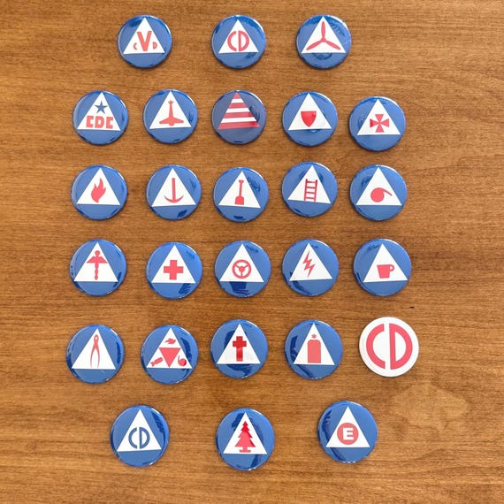 The Ultimate U.S. Civilian Defense Insignia magnet package. All 26 Insignia from the US Civil Defense poster. Button magnets are 1.5” round.