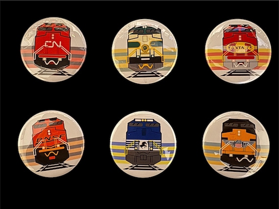 Train Magnet Button Pack. Pack of 6 train buttons. Illustrated and hand-pressed right here by us.  Great unique gift for railfans.