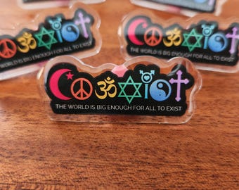 Pin de coexistencia humana: diseño colorido de insignia de inclusión