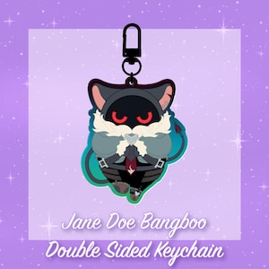 May include: A double-sided keychain featuring a stylized character with black fur, red eyes, a white fluffy collar, and a grey hooded cloak. The character has a long tail with a red tip and wears a red tie. Text below reads Jane Doe Bangboo Double Sided Keychain.