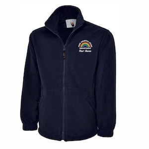 May include: Navy blue fleece jacket with a full zip and a high collar. The jacket has a rainbow design with the text "YOUR HOSPITAL NAME", "DEPARTMENT", and "Your Name". It has two front pockets.