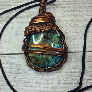 Chrysocolla wrapped in copper