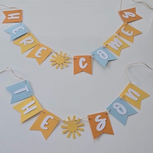 Banner "Aquí viene el hijo": Decoración para baby shower con temática de sol