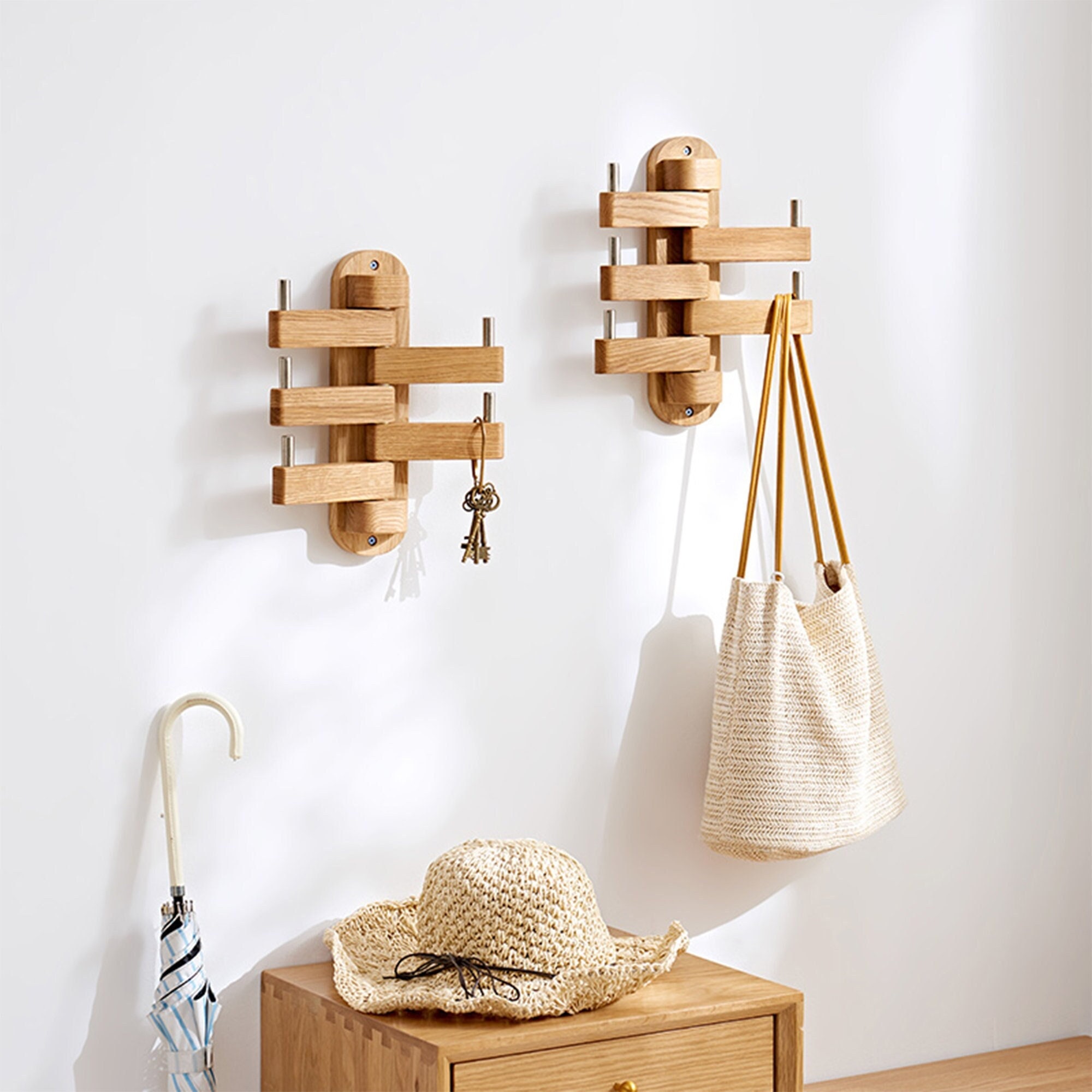 Purse hanger outlet for wall