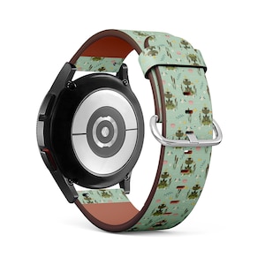 May include: A green and brown watch strap with a frog pattern. The strap is made of leather and has a silver buckle.