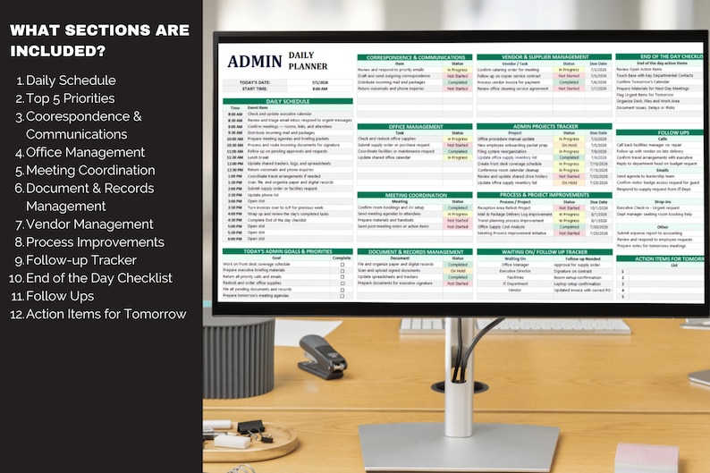 May include: A computer monitor displaying a daily planner titled "ADMIN DAILY PLANNER." The planner includes sections for schedule, priorities, communications, office management, and more. The monitor sits on a wooden desk with office supplies.