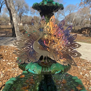 Peacock with fanned feathers, blued and clear coated