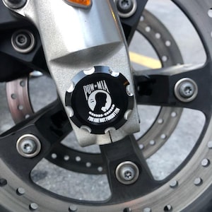 Contrast Cut Front Axle Nut Covers for Harley Touring, Trike, V-Rods, Dyna&#39;s, several designs as well as custom work available.