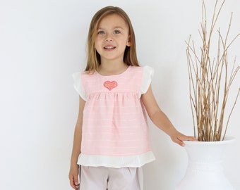 Girls' blouse with shorts and heart accessories