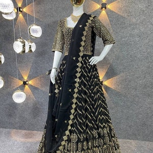 Black gown with golden work discount