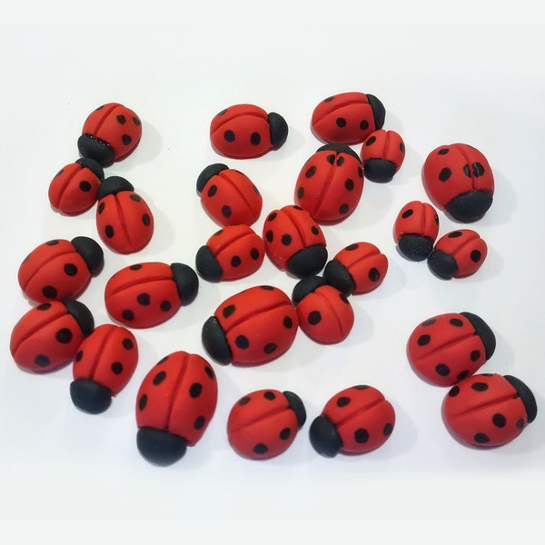 A set of 25 fondant Ladybugs cake or cupcake toppers.