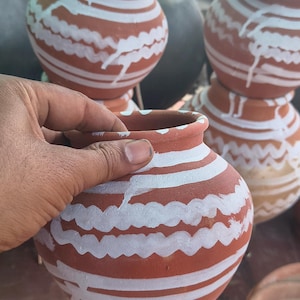 hand painted terracotta water pot traditional indian clay matka  for nature  cooling. rustic hand engraved earthware  pitcher eco frinendly