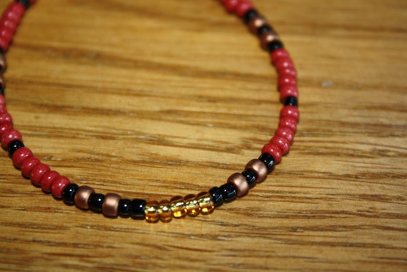 Red and black beaded bracelet clearance