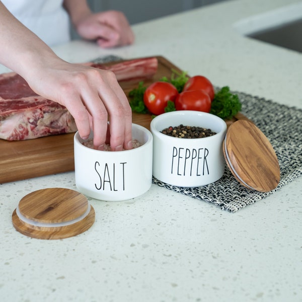 Heartland Home Ceramic Salt Cellar Set with Acacia Wood Lids.  White and Black 9oz Stoneware Stackable Salt and Pepper Container Set