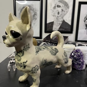 Tattooed Clay Dog Sculpture: Handmade Cartoon Art Object
