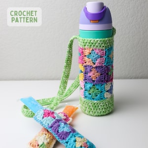May include: A colorful crochet water bottle holder with a matching popsicle sleeve. The holder is green, with a floral pattern in shades of pink, blue, yellow, and purple. The water bottle is purple and green. The text "CROCHET PATTERN" is in the upper left corner.