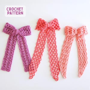May include: Three crocheted bow ties in shades of pink and purple are displayed against a white background. The bows have long, openwork tails. The text "CROCHET PATTERN" is in a purple box in the upper left corner.