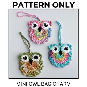May include: Three crocheted owl bag charms with hanging loops. The owls feature large white and black eyes, black beaks, and bodies made of variegated yarn in pink, yellow, blue, and green tones. The text PATTERN ONLY and MINI OWL BAG CHARM is visible.