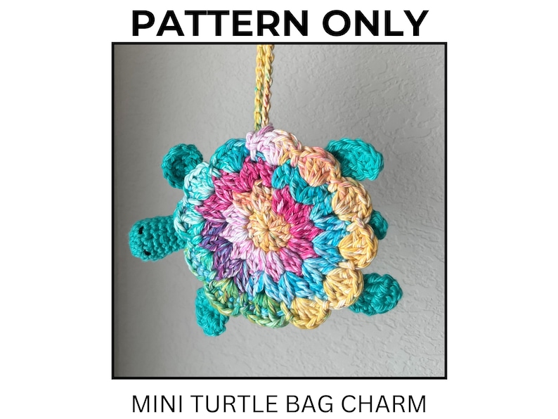 May include: A crochet mini turtle bag charm with a multicolored shell featuring pink, purple, yellow, and blue yarn. The turtle has a solid teal head and four teal flippers. A yellow and orange braided cord is attached to the top. Text reads PATTERN ONLY MINI TURTLE BAG CHARM.