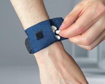 MicroCarry wristband with water-resistance pouch to carry small essentials (mint, gum, pills, jewelry, keys)