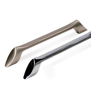 May include: Two cabinet pulls. One is a brushed bronze color, the other is chrome. Both have a curved design with a slight arch and angled ends. The pulls are set against a white background.