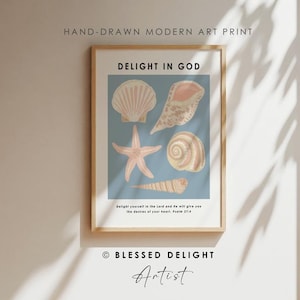 May include: A framed art print featuring a blue background with illustrations of various seashells and a starfish. The text reads DELIGHT IN GOD at the top and includes the scripture verse Delight yourself in the Lord and he will give you the desires of your heart. Psalm 37:4 at the bottom.