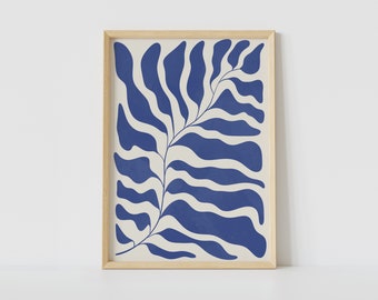 May include: A framed print of a stylized blue leaf on a cream background. The leaf is made up of wavy lines and has a modern abstract design.