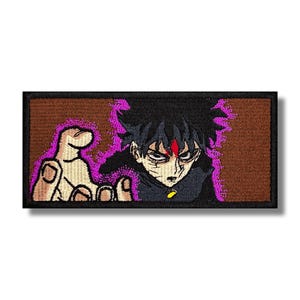May include: An embroidered patch featuring a character from a Japanese anime series. The character has black hair and is wearing a black uniform. The character's hand is outstretched with purple energy emanating from it. The background is brown.